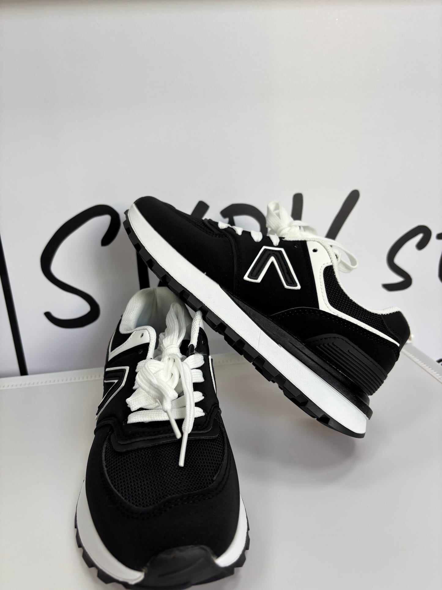 Tenis v