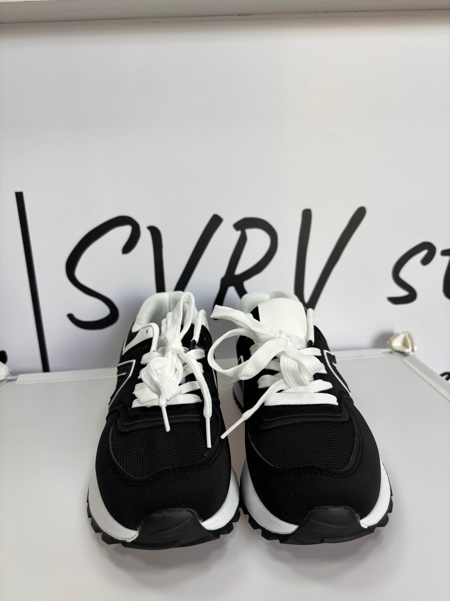 Tenis v