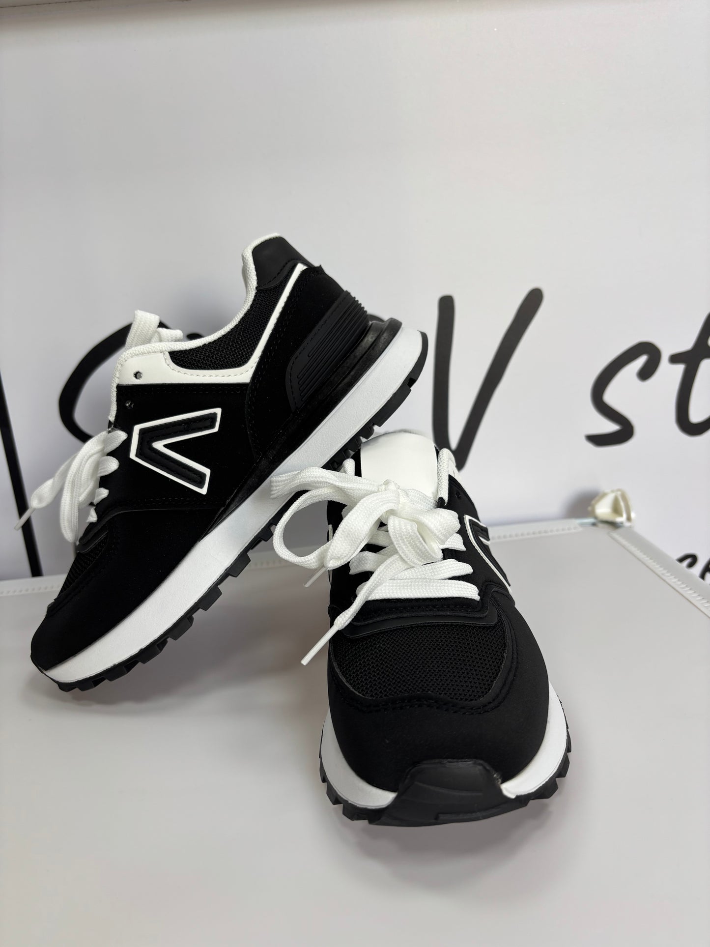 Tenis v