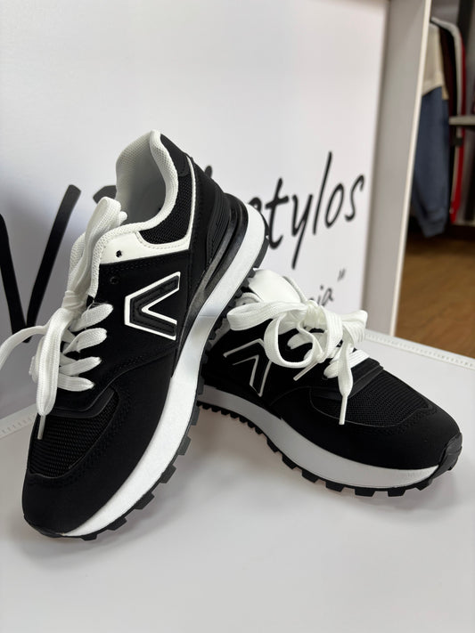 Tenis v