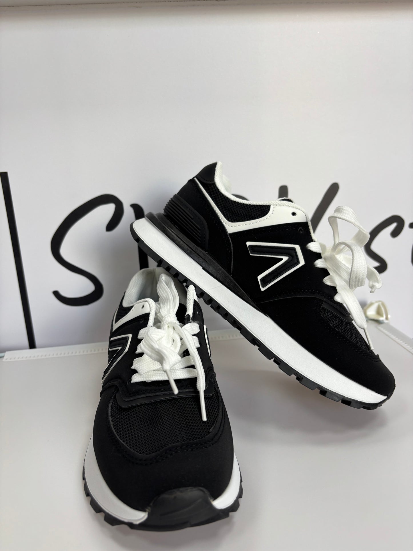 Tenis v